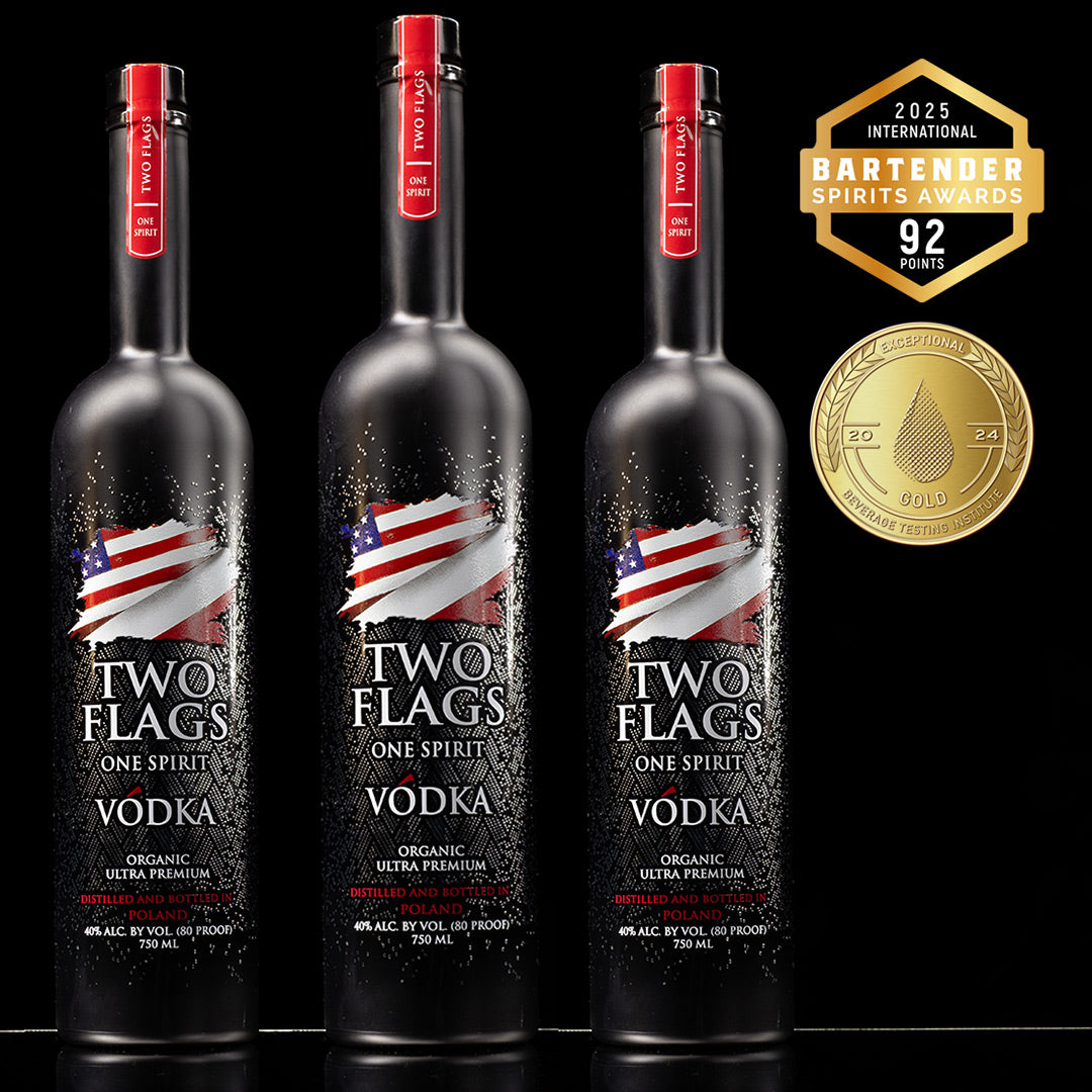 Three bottles of Two Flags™ One Spirit Vodka, featuring organic ultra-premium vodka and awards, perfect for celebrations.